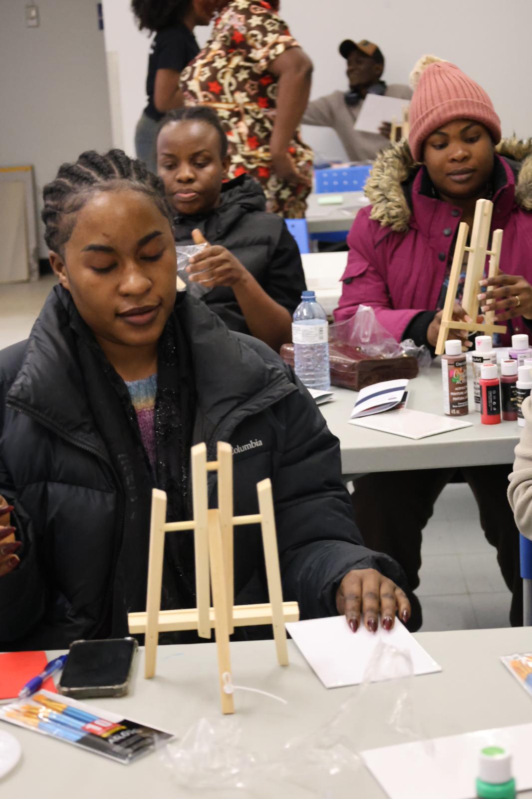 Young people painting during a creative workshop